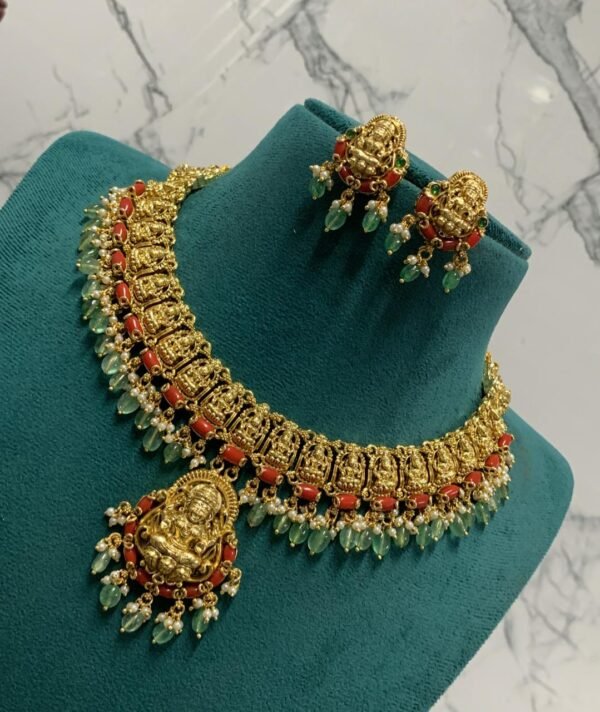 Goddess Lakshmi Devi Necklace Set with Green Color Beads, Pearls and Corals and Pair of Ear Rings